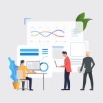 Business men working on computers and analyzing financial charts